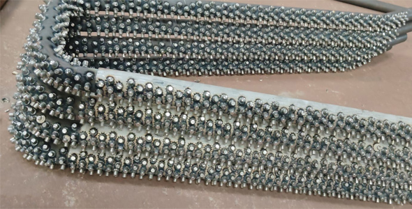 Weld studs for bed coils